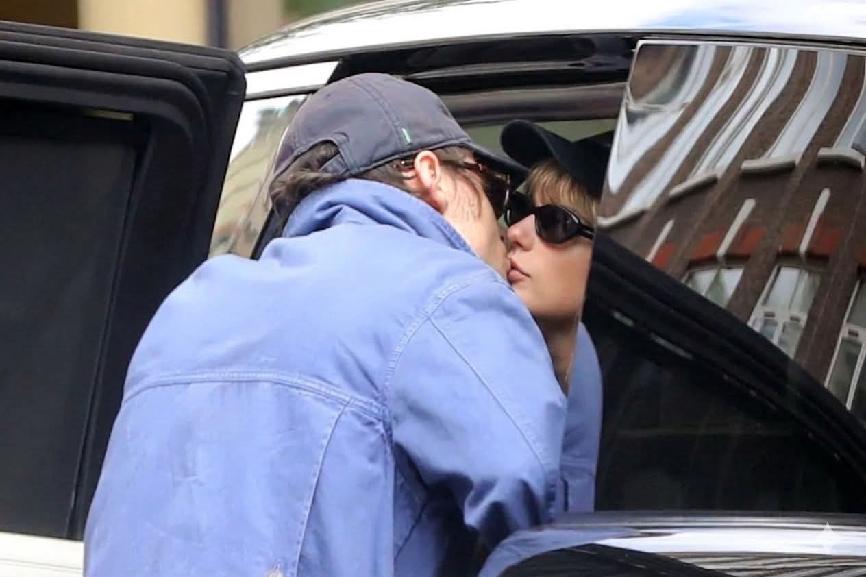 Truth behind Taylor Swift's kiss with Mystery Man revealed: As she is accused of cheating on Travis Kelce, insiders reveals what really happened... and how her fiance reacted and what it meant for the big wedding