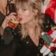 News Update: Fans have pointed out that Taylor Swift appears to have a tendency of DRINKING booze IN PUBLIC when celebrating Kansas City Chiefs victory by taking pictures and drinking booze in the public place...