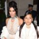 Fans criticized and blasted Kim Kardashian for puting on a bead gowns during her recent visit. Even though North West also supports the idea... What a brat child is this!!!