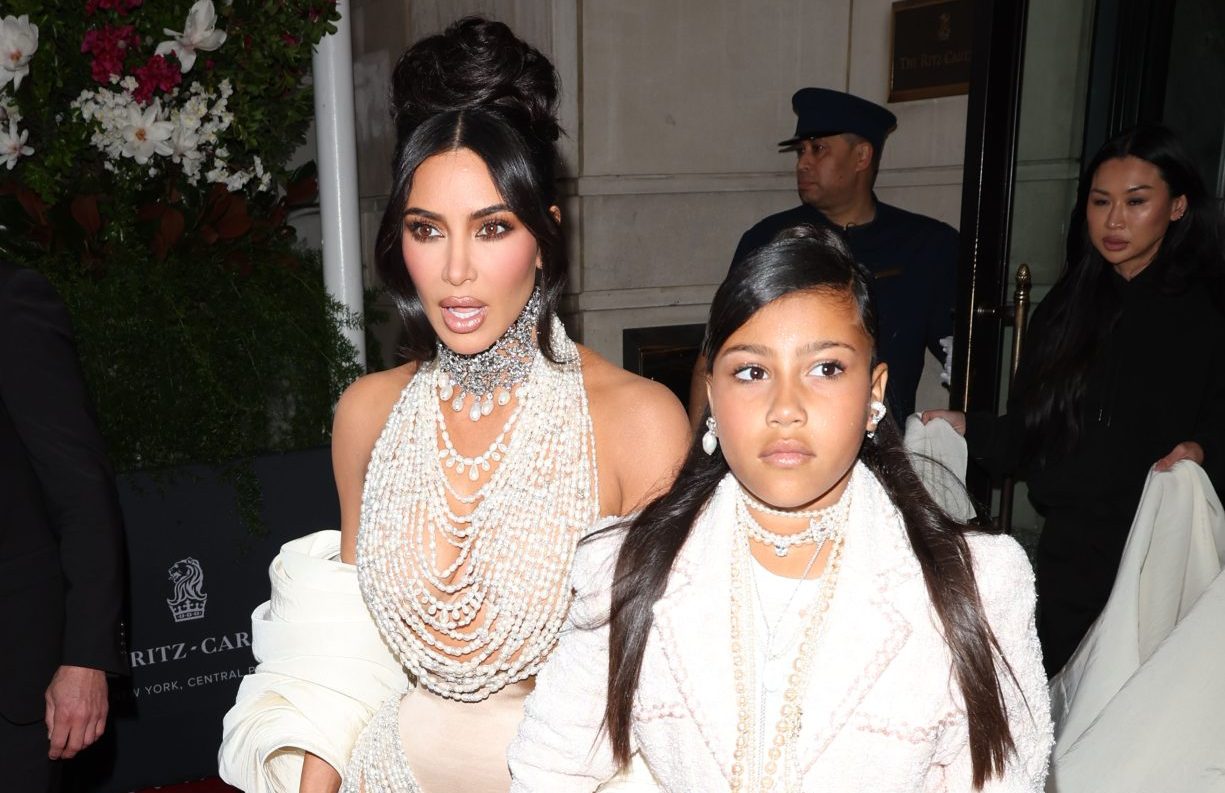 Fans criticized and blasted Kim Kardashian for puting on a bead gowns during her recent visit. Even though North West also supports the idea... What a brat child is this!!!