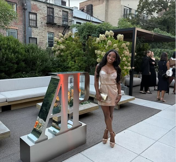 Simone Biles wears Golden bikkini