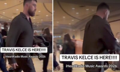 Travis Kelce spotted looking very angry arriving at the 2026 iHeartRadio Music Awards in new video — not only because Taylor Swift refuses to walk with him, but because... See more details and clear clip